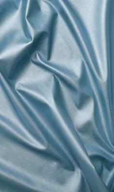 a close up view of a blue fabric