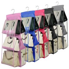 several different colored bags hanging from hooks