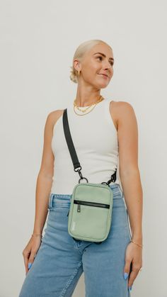 Our crossbody sling bags are ready for any adventure you are. Inside you will find credit card holders and pockets galore. Take your sling bag all the way to Europe and keep organized while exploring, or to Disneyland to hold your essentials while you ride Space Mountain! Or just wear it around town because who doesn't want to be cute while staying organized? * Each crossbody comes with 1 black strap that is 4 feet 4 inches long Dimensions 7.2" H x 5.2" W x 2.2" D *Patented Green Crossbody Chest Bag For On-the-go, Versatile Chest Bag With Cell Phone Pocket For Travel, Casual Phone Bag With Zipper Pocket For Travel, Everyday Green Chest Bag With Cell Phone Pocket, Versatile Green Chest Bag With Adjustable Strap, Green Chest Bag With Cell Phone Pocket For Travel, Versatile Crossbody Chest Bag For Outdoor Activities, Functional Crossbody Phone Bag For Travel, Outdoor Phone Shoulder Bag With Adjustable Strap