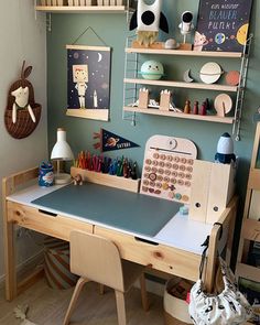 a child's desk and chair in a room