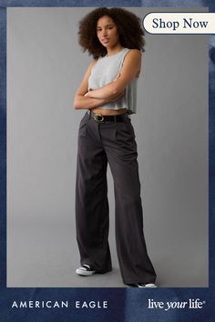 Lightweight, stretchy woven fabrication/Button fly/Pleats in front/Wide leg Trendy High Rise Wide Leg Workwear Pants, Trendy Wide-leg Bottoms, Trendy Rayon Bottoms For Day Out, Chic Straight Leg Rayon Bottoms, Black Rayon Bottoms For Workwear, High Waist Rayon Pants For Work, Stretch Rayon Fall Bottoms, High Rise Bottoms For Business Casual Summer, Trendy Business Casual Bottoms With Elastic Waistband