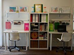 two white desks sitting next to each other on top of a hard wood floor