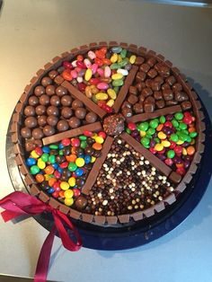 a chocolate cake decorated with candy and candies