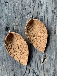 These are a pair of geniune leather earrings. Light tan brown suede with a flower texture embossed on them. You can choose your size Picture of the polka dot earrings is just for size referece Small - Length: 1.5 Inches Width: .75 Inches Drop length: 2 InchesMedium - Length: 2 Inches Width: 1.5 Inches Drop length: 2.5 InchesLarge - Length: 2.5 Inches Width: 1.5 Inches Drop length: 3 Inches Suede Earrings, Polka Dot Earrings, Dot Earrings, Flower Texture, Shoe Gifts, Light Tan, Tan Suede, Leather Earrings, Brown Suede