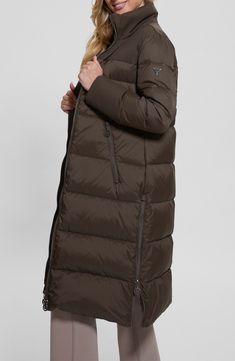 A two-way zipper lets you regulate the warmth of a cozy coat fixed with a roomy hood you can add or subtract depending on the forecast. Two-way front-zip closure Stand collar with removable hood Front zip pockets Lined, with 80% waterfowl down, 30% waterfowl feather fill 100% polyamide Hand wash, dry flat Made in China Down Outerwear With Detachable Hood For Travel, Winter Travel Outerwear With Zipper Closure, Winter Travel Outerwear With Zip Fly, Travel Outerwear With Detachable Hood In Down, Travel Down Outerwear With Detachable Hood, Travel Outerwear With Detachable Hood, Cozy Coats, Down Puffer Coat, Puffer Coat