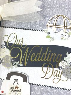 a wedding card with flowers and ribbons on it