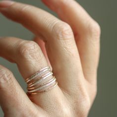 These dainty stacking rings have great texture and sparkle. The design is clean and simple, and the unique texture adds a little sophisticated whimsey when worn alone or paired with other stackers. Available in sterling silver or 14k yellow or rose gold fill. The width of the band is around 1.5 mm. All Rebecca Haas Jewelry is handcrafted by me in my Southern Vermont Studio from recycled and ethically sourced materials. Rose Gold Stackable Open Rings With Simple Design, Adjustable Rose Gold Stackable Rings Fine Jewelry, Adjustable Rose Gold Stackable Rings In Fine Jewelry Style, Dainty Rose Gold Toe Ring, Dainty Rose Gold Stackable Rings For Everyday, Rose Gold Sterling Silver Open Stackable Rings, Simple Hammered Rose Gold Jewelry, Delicate Rose Gold Stackable Midi Rings, Everyday Rose Gold Midi Rings In Sterling Silver