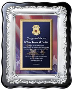 a framed plaque with an officer's name on it