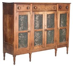 an old wooden cabinet with glass doors and knobs on the front, isolated against a white background