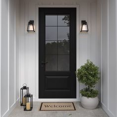 a welcome mat and lantern on the front door of a house with black doors, white walls and windows