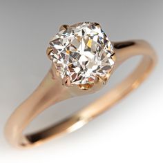 a fancy ring with a diamond in the center