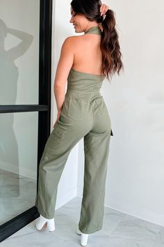 SELF: 100% COTTON. LINING: 100% RAYON Model Wearing Size Small Color: Olive Denim Material Collar Detail Halter Neck Button Front Closure With Zipper Fly 2 Cargo Pockets Wide Leg Jumpsuit Does Not Have Stretch 29“ Inseam For Model Size Specs Please Check Size Charts Launched: 9/12/24 Spring Cargo Style Fitted Jumpsuits And Rompers, Cargo Style Jumpsuits And Rompers For Spring, Fitted Cargo Style Jumpsuits And Rompers For Spring, Fitted Cargo Style Jumpsuits For Spring, Casual Olive Jumpsuits And Rompers For Spring, Chic Green Overalls, Trendy Khaki Jumpsuits And Rompers For Spring, Casual Khaki Cotton Jumpsuits And Rompers, Khaki Cotton Jumpsuits And Rompers For Fall