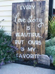 a wooden sign that says every love story is beautiful, but ourss is my favorite