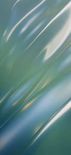 an abstract photo of blue and green water