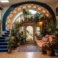 a living room filled with lots of plants and furniture