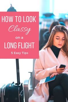 a woman sitting in an airport looking at her cell phone and texting how to look classy on a long flight