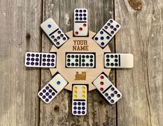 a wooden board game with dominos and the word beard on it