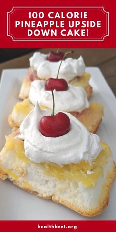 three slices of pineapple upside down cake with whipped cream and cherries on top