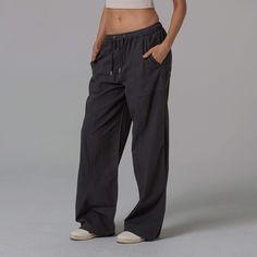 Meet your new go-to. Our Paneled Pant seamlessly blends comfort with style. Made from a durable yet breathable fabric, these pants offer a relaxed fit with a modern, tapered leg. 55% Cotton, 45% Tencel 235 GSM True to size Relaxed Fit Straight Leg Cargo Pants For Loungewear, Versatile Relaxed Fit Cargo Pants For Loungewear, Straight Leg Cotton Sweatpants For Yoga, Athleisure Cargo Pants For Everyday, Wide Leg Joggers With Pockets, Everyday Wide Leg Joggers With Pockets, Solid Color Parachute Pants In Athleisure Style, Leisure Gray Straight Leg Pants, Gray Straight Leg Pants For Leisure