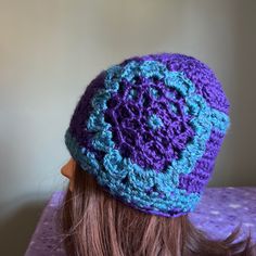 Crochet Handmade Flowers Beanie Soft Satin Acrylic Clean Never Worn New Medium Hat. Warmest Winter Hat. Wash Suggestion In Sock Or Cloth Laundry Bag To Prevent Piling Fuzz And Maintain Form. Very Pretty. Purple Satin With Teal Satin Stars Band Trim And Weave Headband With Teal Flower. American Made American Made Purple Adjustable Crochet Hat, Adjustable Purple Crochet Yarn Hat, Adjustable Purple Crochet Hat, Adjustable Purple Yarn Crochet Hat, Adjustable Hand Knitted Purple Crochet Hat, Adjustable Purple Hand Knitted Crochet Hat, Adjustable Hand-knitted Purple Crochet Hat, Hand Knitted Purple Yarn Hats, Purple Crochet Hat For Spring