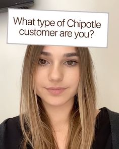 a woman holding up a sign that says what type of chipotle customer are you?