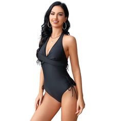 Elevate your swimwear collection with this Women's Halter Swimsuit. This one-piece tankini features a front twist detail and a deep V neckline, creating a stylish and flattering look. The side ruching adds a touch of elegance to the design, making it a perfect choice for your summer 2024 adventures. Crafted from a blend of 82% polyester and 18% spandex, this swimsuit offers a comfortable and stretchy fit that moves with you. Available in three trendy styles and colors: Black, Camouflage Rose, an Solid One-piece Swimwear With Crisscross Straps, One-piece Cross-tied Swimwear For Poolside, Cross-tied Swimwear For Swimming, Solid Swimwear With Crisscross Straps For Pool, Solid Cross-tied Swimwear For Poolside, One-piece Cross-tied Swimwear For Beach Season, Solid Color Cross-tied Swimwear For Poolside, Cross-tied One-piece Swimwear For Swimming, One-piece Cross-tied Swimwear