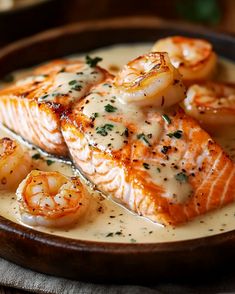 some salmon and shrimp are on a plate