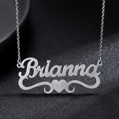 Frosted Heart Name Necklace is a beautiful bespoke frosted single nameplate personalized jewelry necklace for classy stylish jewelry lovers. This appealingly beautiful name necklace give a prestigious quality garnish for your attire. You can unleash your creative powers here. We know how creative you are as an individual. Maybe you are frustrated because you haven't got an opportunity to showcase your artistic creative talents. Well, this is the chance. Make full use of it. Don't wait and limit Personalised Jewellery Necklaces, Chain For Women, Custom Name Necklace, Jewelry Manufacturers, Gift For Wife, Stylish Jewelry, Personalized Necklace, Jewelry Lover, Name Plate