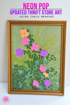 an image of a painting with flowers on it and the text neon pop updated thrift store art using chalk markers