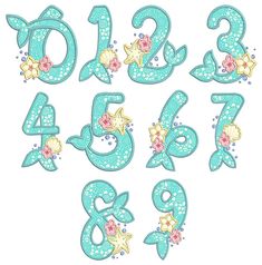 the letters and numbers are made up of blue sequins with flowers on them