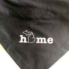 a black towel with the state of maine printed on it