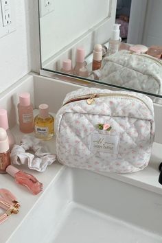 Exclusive castle pattern cosmetic bag. It is quilted and lined with a “made of magic” pink print, and features a heart zipper pull. Can be used a travel bag, makeup bag, tech bag, skincare bag, and so much more.Size: 8” x 6” x 4”100% Nylon *Final sale / not eligible for discounts Luxury Everyday Cosmetic Bag With Zipper, Luxury Cosmetic Pouch Bag, Affordable Trendy White Cosmetic Bag, Luxury Elegant Cosmetic Bag, Affordable Pink Playful Cosmetic Bag, Jemina Makeup Bag Roller Rabbit, Douyin Makeup Bag, Cheap Kawaii Pouch Cosmetic Bag, Spring Travel Cosmetic Bag