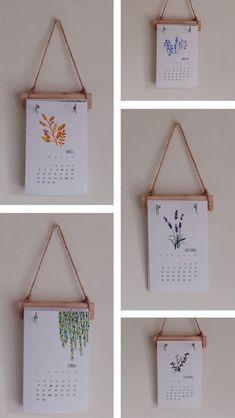 four pictures of calendars hanging on the wall with clothes pins attached to each one