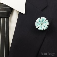 "Pale Turquoise Kanzashi Flower Lapel Pin with 4mm Swarovski Clear Crystal It can be made with 6mm Swarovski Crystal SIZE: 1.4\"-1.5\"(3.5-3.8sm) Comes in a luxury Black box with Non-Tarnish Cotton. NOTE Please note, that items may not be as large as they appear! Because every item is handmade (each petal one by one), flower shape may slightly vary! While every effort is made to accurately represent the true colors of the ribbon/fabric used in my work, your monitor settings may affect the appear Green Flower-shaped Brooches For Weddings, Blue Flower Brooch For Wedding, Blue Wedding Brooches With Handmade Flowers, Elegant Green Lapel Pin For Wedding, Green Wedding Brooches, Elegant Green Wedding Lapel Pin, Lapel Flower Wedding, Flower Lapel, Flower Lapel Pin