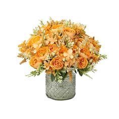 a vase filled with orange flowers and greenery