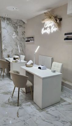 an office with marble floors and white desks