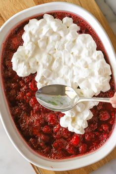 a bowl filled with pudding and whipped cream