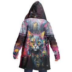 a person wearing a colorful jacket with a cat on it