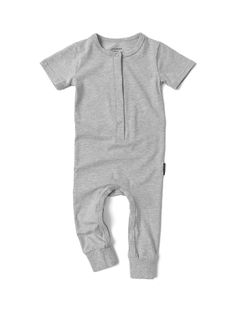 Where functional meets adorable. Enjoy all the snuggles in our so-soft Classic Snap Romper! Pair it with our LB socks or a Plush Blanket, and your little one will be all bundled up + ready to go. Color: Grey Four functional snaps down the front Inner leg seam snaps for easy diaper changes Rollable ankle cuffs Signature “Little Bipsy” side tag Material + Wash: 95% cotton | 5% spandex Gets softer with each wash Machine wash gentle with like colors Dry on low heat Sizing + Fit: True to size Please Soft Fitted Onesie For Bedtime, Soft Cotton Onesie For Bedtime, Cotton Onesie For Sleep, Soft Cotton Onesie For Sleep, Soft Fitted Onesie For Playtime, Soft Cotton Bedtime Onesie, Fitted Solid Color Onesie For Sleep, Fitted Onesie For Sleep, Easy Outfit