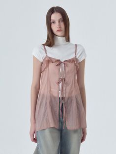 This is a minimal and modern dress by ETMON that is made out of high quality and sturdy material. With distinctive mood of the design and comfortable wear, you can style it for your chic and stylish daily outfit.- Sheer lace fabric slip dress- Ruffle detail along the chest line- 2 way reversible item on front and back Spring Sleeveless Sheer Mini Dress, Pink Sheer Camisole Dress, Flirty Sheer V-neck Mini Dress, Pink Sheer Feminine Mini Dress, Pink Sheer Sleeveless Mini Dress, Modern Dress, Sheer Lace, Ruffle Dress, Lace Fabric