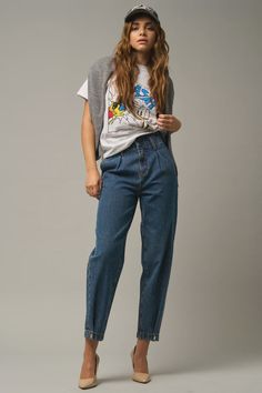 DescriptionThe Hopi High Rise Balloon Jeans feature: Non-stretch denim material Pleated front Button hem on ankle Zipper fly Super high rise: 13 to 14" Ankle to Full length depending on your height: 26 1/2" inseam Leg opening: 12 to 14" Made in the USA FitTrue to size, super high rise. Model is 5'7" wearing a size 3. Material100% Cotton Balloon Jeans, Night Fashion, Denim Material, Waist Line, Mens Outerwear, Elevate Your Look, Dark Denim, Button Detail, Denim Women