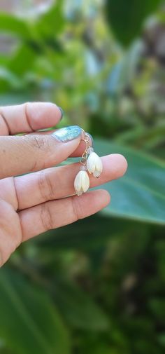 Pikake Flower Earrings 14K Gold Filled Hand Made in Lahaina, Hawaii Lightweight Delicate Petal-shaped Earrings With Flower Charm, Delicate White Teardrop Flower Earrings, Delicate Handmade Petal Earrings, Delicate Teardrop Flower Earrings, Delicate Flower-shaped Pearl Earrings With Ear Wire, White Flower-shaped Dainty Pearl Earrings, Delicate Flower Shaped Pearl Earrings With Ear Wire, Delicate Teardrop Flower Earrings For Pierced Ears, White Flower-shaped Cluster Earrings For Gifts