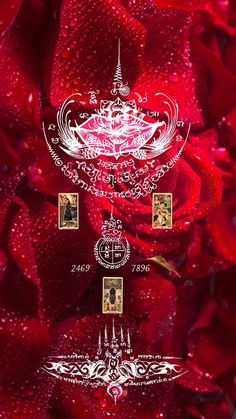 a red rose with the names and date on it, surrounded by water droplets in front of