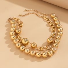 This Double Layered Faux Pearl Necklace comes in three stunning color options: Gold, White, and Gold+White. Elevate your style with this elegant and versatile necklace that is sure to turn heads. Material: imitation pearl+aluminum chain Long Metal Chain Necklace With Pearls, Gold-tone Metal Layered Necklace With Clavicle Chain, Gold-tone Layered Clavicle Chain Necklace, Elegant Alloy Chain Pearl Necklace, Elegant Metal Layered Necklace With Beaded Chain, Elegant Layered Metal Necklace With Beaded Chain, Elegant Alloy Pearl Necklace With Chain, Elegant Beaded Chain Layered Necklace, Elegant Pearl Necklace With Alloy Chain