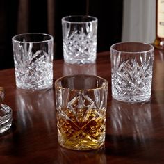 If you're looking for a glass that matches the richness of your favorite scotch or whiskey, our Dublin cut crystal whiskey glasses fit the bill. Made of intricately cut crystal, our whiskey glasses are the perfect addition to any home bar. These whiskey glasses come as a set of four, and each one holds up to 11 ounces. Hand wash recommended. Crystal whiskey glasses measure 4" tall and 3" in diameter. Lead crystal. Mercer41 | Mercer41 Aanyla 4 - Piece Beverage Serving Set 4.0 H x 3.0 W in Crystal Drinking Glasses Design, Crystal Drinkware, Crystal Whiskey Glasses, Whiskey Glasses Set, Glasses Fit, Drinkware Sets, Whiskey Gifts, Whisky Glass, Whiskey Decanter