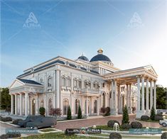 a large white building with columns and arches on the front, surrounded by greenery