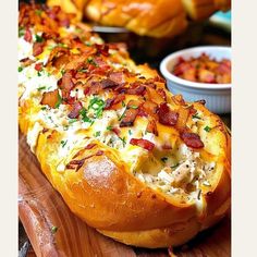 the bread is loaded with bacon and cheese