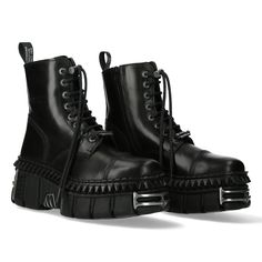 Shop now and elevate your style with our black metallic leather gothic punk biker boots. featuring a platform sole and lace-up design, these boots are perfect for those seeking a unique and edgy look. shop now and step into the world of gothic fashion! New Rock Boots, Rock Boots, Goth Subculture, Gothic Boots, Metallic Boots, Punk Boots, Leather Biker Boots, New Rock, Military Boots