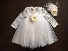 A beautiful ballerina baptism dress with ivory headband and sash Elegant Tutu Dress With Lace Bodice For Confirmation, Cream Tulle Baptism Dress For Ceremony, Fitted White Tutu Dress For Confirmation, White Fitted Tutu Dress For Confirmation, Cream Tulle Tutu Dress For Baptism, Elegant Tutu Dress With Lace Trim For First Communion, Elegant Lace Tutu Dress For First Communion, Elegant Cream Tutu Dress With Lace Bodice, Elegant First Communion Tutu Dress With Lace Bodice