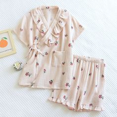 This Two-Piece Set Kawaii Sleepwear﻿ is perfect for chilling and relaxing at your home. Suitable for nighttime looks. It features a button-down notched collar design and a pocket for added functionality. It is made from a premium and durable fabric which is also washing machine friendly. You only need this loungewear to unwind at home. They project adaptability and effortless grace with each stride you take since they are soft and pleasant to the touch. Each of our comfy sets is made to make you Comfortable Sleepwear With Pockets For Sleepover, Cotton Sleepwear With Pockets For Sleepovers, Pink Sleepwear With Pockets For Loungewear, Kawaii Cotton Sleepwear For Bedtime, Cute Relaxed Fit Sleep Sets, Cute Relaxed Fit Sleepwear Sets, Pink Sleepwear With Pockets Relaxed Fit, Pink Sleepwear With Pockets In Relaxed Fit, Spring Sleepwear With Pockets